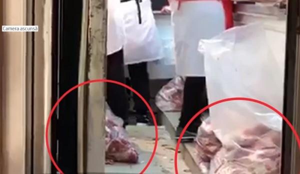 Exclusiv. În cea mai mare hală din Bucureşti, carnea pentru Sărăbători e vândută direct de pe jos, în praful unei lucrări de construcţii