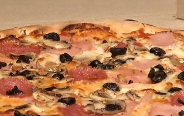 Studiu: Pizza creează dependenţă. Două ingrediente de bază ar fi de vină