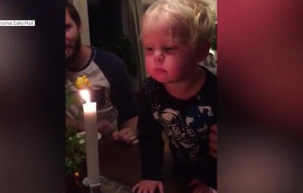 Un băieţel de doi ani face senzaţie pe internet. S-a chinuit aproape un minut să stingă o lumânare (Video)