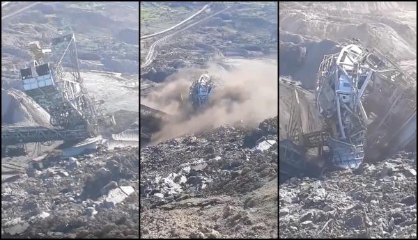 Momentul în care un excavator gigant se prăbuşeşte în mina de la Alunu. Imagini dramatice la Vâlcea (Video)