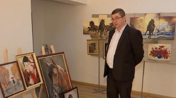 Un jandarm în rezervă din Dej a dat milităria pentru pictură
