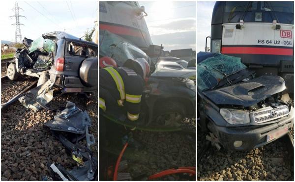 SUV spulberat de o locomotivă la Bacău, șoferul a murit, doi copii preluați de ambulanțe. VIDEO