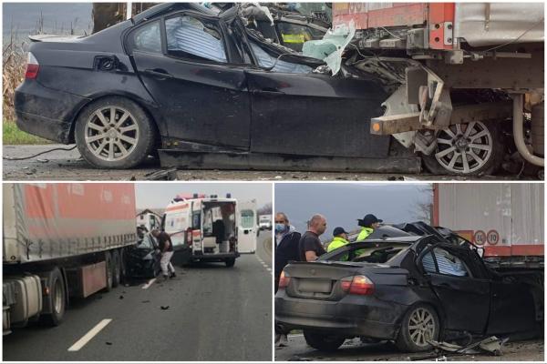 Un șofer de 22 de ani „s-a înfipt” cu BMW-ul într-un TIR, pe DN1C. Tânărul conducea cu viteză