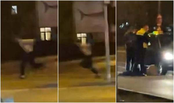 Momentul în care micul tâlhar recidivist de la Timişoara fuge încătuşat de poliţişti şi e lovit de o maşină. Martorii, râzând: "A dat maşina peste el!"