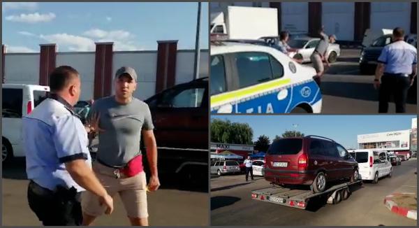 Şofer din Buzău, acuzat de transport ilegal, scandal cu poliţia şi presa în parcarea unui hypermarket. "Pe domeniul public îţi dau una de îţi crapă capul"