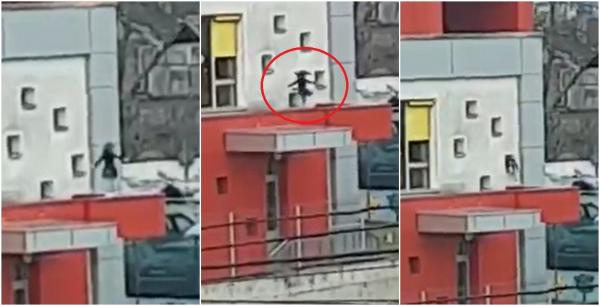 Fetiță de câțiva anișori, filmată în timp ce dansează pe copertina unei grădinițe din Cluj. Copila face piruete la peste trei metri înălţime