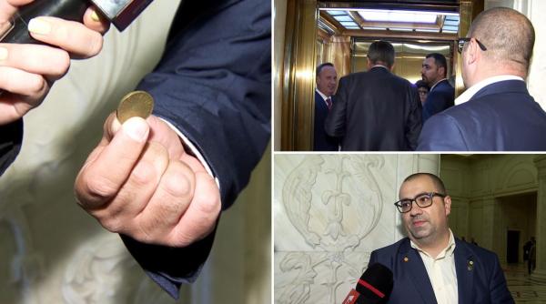 Un deputat AUR "l-a fugărit" pe ministrul Finanțelor cu 50 de bani, în Parlament: "La TV erați expert. Luați-i! De ce nu îi luați?"