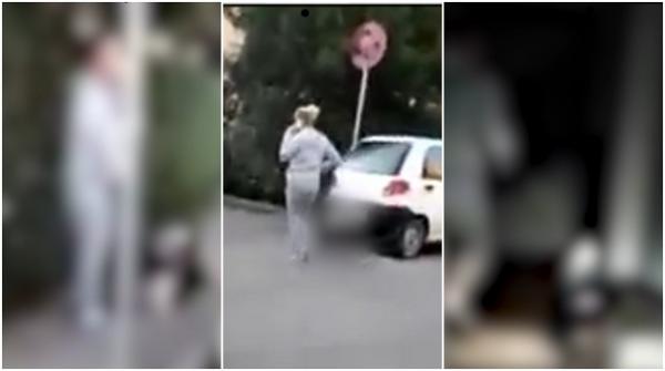 "Stai aici că sun să vină poliţia!". Bull Terrier plimbat de stăpână pe stradă, după ce animalul ar fi omorât un alt căţel, într-un parc din Târgu Jiu