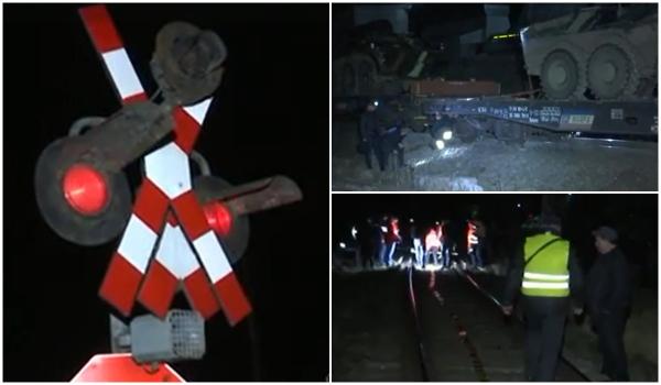 Filmul incidentului feroviar din Braşov. Momentul deraierii vagonului cu blindate, surprins de un şofer care aştepta la barieră