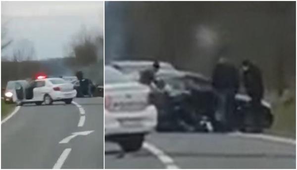 "Au intrat într-unul cu BMW, praf l-au făcut". Șofer blocat și încătușat de poliție pe mijlocul drumului, în Arad