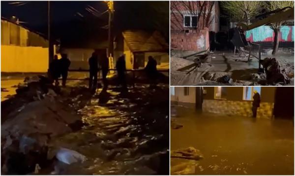 ''Nenorocire, ne ia apa!" Zeci de case inundate, după o ploaie torenţială de doar 20 de minute. Oamenii din Bocşa sunt disperaţi