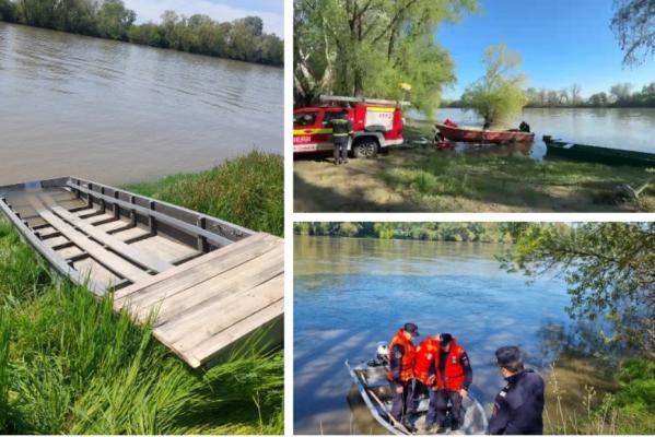 Primele imagini cu barca răsturnată în Mureş, în care s-au urcat 12 persoane. A fost găsită la 4 km distanţă de locul în care s-a răsturnat