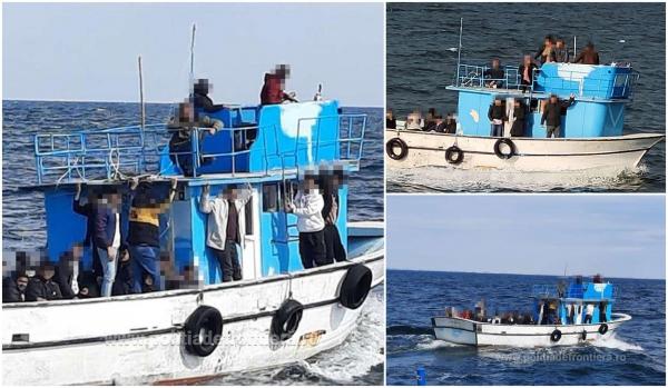 Zeci de migranți, inclusiv copii, prinși pe Marea Neagră încercând să intre ilegal în țară. Erau înghesuiți într-o barcă veche din lemn, fără veste de salvare