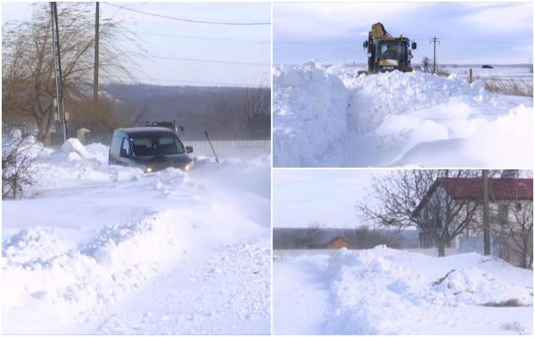 Troiene de un metru şi jumătate pe unele drumuri din Iaşi. Unde n-au mai făcut faţă utilajele de deszăpezire, au intervenit şenilatele