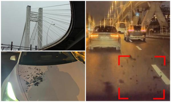 Momentul în care o bucată de tencuială se desprinde de pe Podul Basarab şi cade pe o maşină în mers. Şoferul va plăti singur reparaţiile