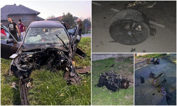 Motorul, cutia de viteze şi roţile unui BMW au zburat zeci de metri pe şosea, după un impact devastator la Buteni, în Arad