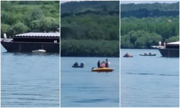 Accidentul naval de pe Dunăre, filmat: momentul în care bărcile sunt lovite puternic de barjă / Cei doi pescari dispăruți, în continuare de negăsit