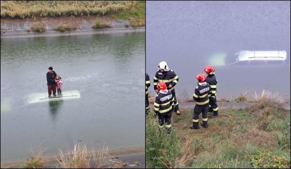 Momentul în care bătrânul și fetița din Argeș sunt salvați, după ce au plonjat cu maşina în canal