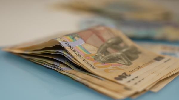 Noi măsuri agreate în coaliţie - 25.000 bugetari şi 10% din parlamentari, concediaţi