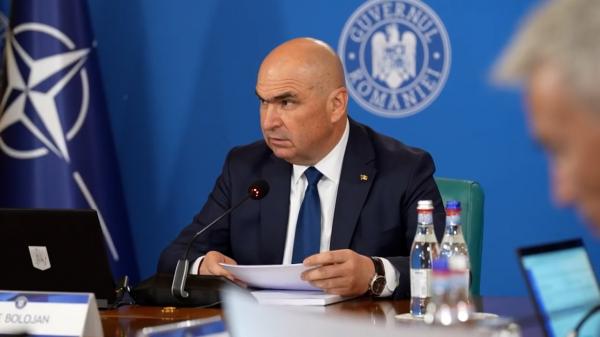 PSD i-a cerut lui Bolojan să-şi dea demisia în pline negocieri pentru stabilirea noului buget