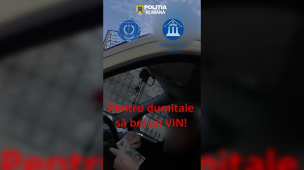 Şofer filmat când încearca să mituiască un poliţist deşi primise doar avertisment: "Dacă nu iei ceva mă supăr"
