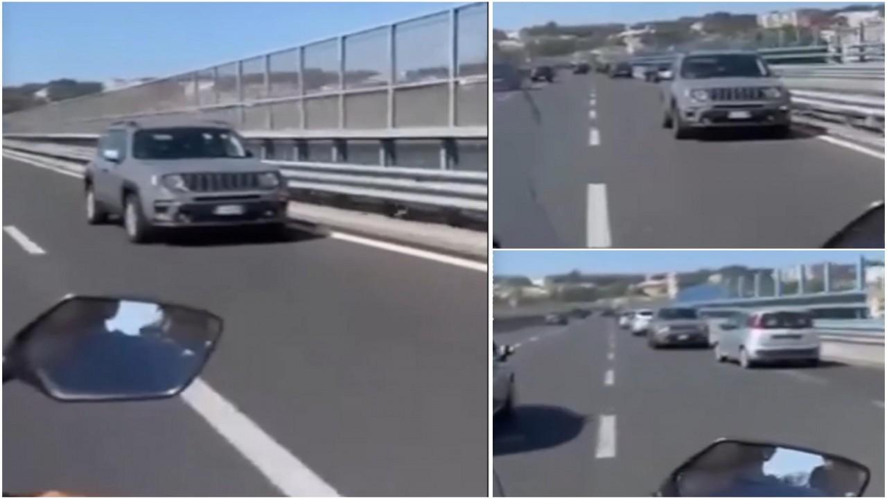 Auto con rumeni, in retromarcia su un’autostrada italiana.  Presumibilmente si sono voltati per raggiungere una stazione di servizio dietro di loro