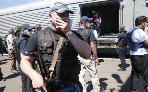 Catastrofa din Ucraina: Trenul în care sunt cadavrele a părăsit gara Torez. Acestea vor fi predate Olandei