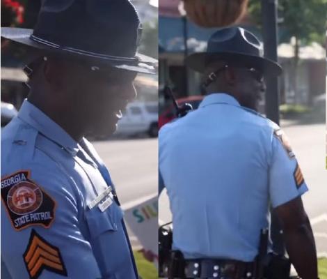 Un poliţist de culoare refuză să îngenuncheze în faţa protestatarilor