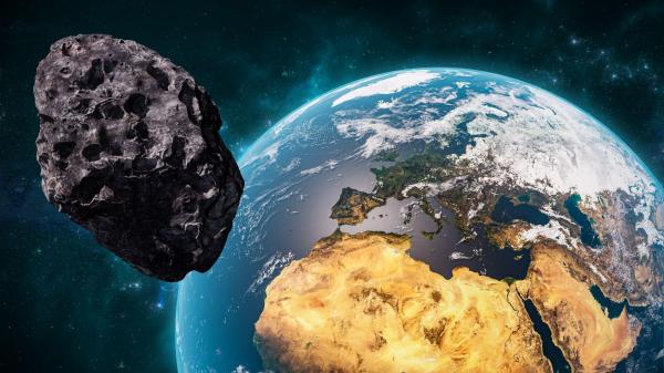 Imagine ilustrativă cu un asteroid care trece pe lângă Pământ