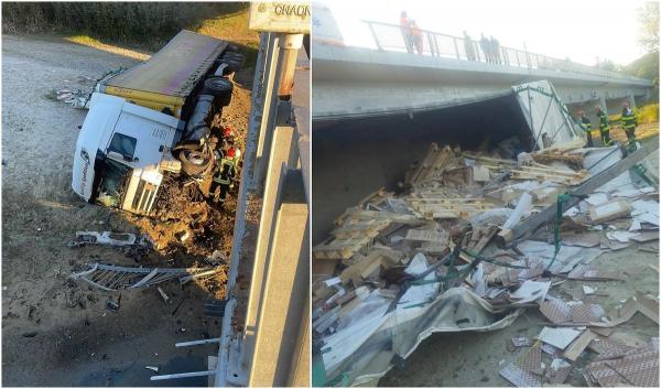 Șofer de TIR, la un pas de moarte după ce a lovit o betonieră și s-a răsturnat cu mastodontul de pe un pod din Vâlcea