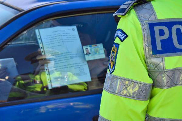 şofer oprit de Poliţie în România, cu actele la control