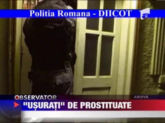 Retea specializata in fraude bancare cu ajutorul prostituatelor, demascata de politisti