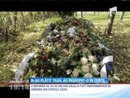 După ce a plătit 70 de ani taxe la biserică, o bătrână de 93 de ani din Sălaj a fost înmormântată în grădină