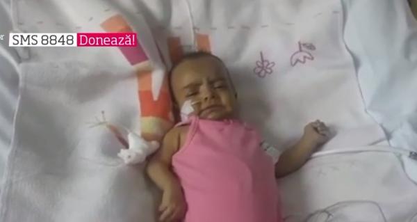 O fetiță de cinci luni luptă să trăiască. Victoria a venit pe lume cu o boală rară, atrezie de căi biliare