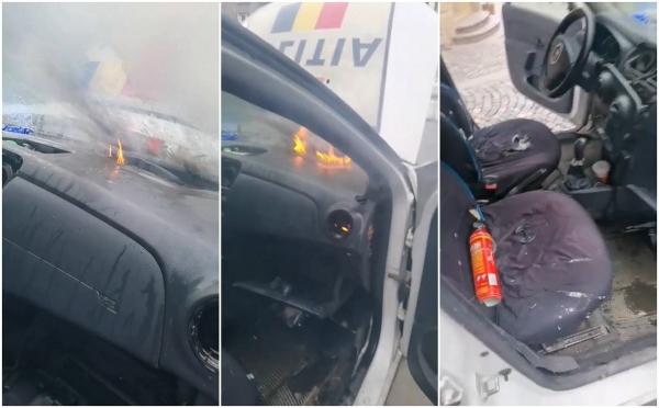 O maşină de Poliţie a luat foc, pe stradă, în Bucureşti. Poliţiştii, plin de nervi: "Ce să stingi, mă, că n-avem extinctoare, n-avem nimic"