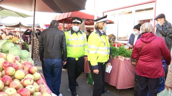 Forţele de ordine supraveghează respectarea restricţiilor impuse, în weekend-ul de Florii, în pieţe şi în zona bisericilor