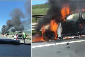 BMW X3 făcut scrum pe autostradă, lângă Aiud. Martorii acuză intervenţia târzie a pompierilor