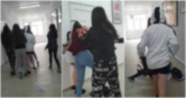 Elevă ruptă cu bătaia de colege, în Sânnicolau Mare. Fata e lovită fără milă și trasă de păr chiar pe holul şcolii - VIDEO