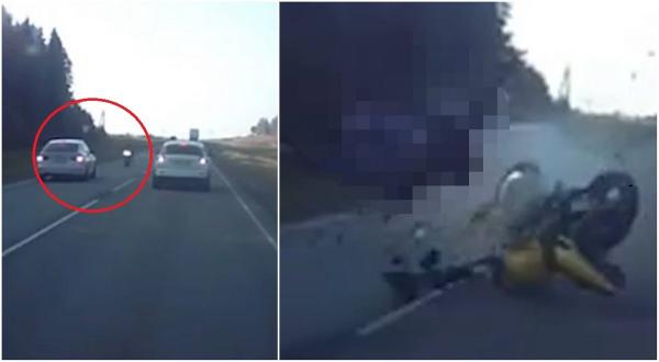 BMW filmat cum spulberă pe contrasens un poliţist pe motocicletă. Accident mortal surprins de o cameră de bord, pe o autostradă din Rusia