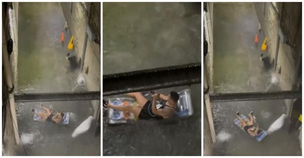 VIDEO. Relaxat şi fără nicio grijă, un bărbat din New York a fost filmat în timp ce fuma dintr-o narghilea, pe o saltea gonflabilă, în mijlocul uraganului Ida