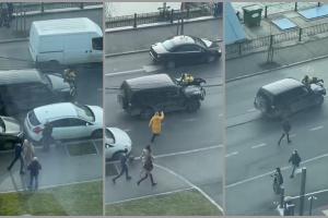 Biciclist al unei firme de curierat, luat pe capota maşinii de un şofer, după un conflict în traficul bucureştean - VIDEO