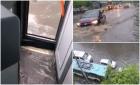 Un șofer STB s-a filmat cum merge pe un bulevard complet inundat: ''Ia uite, intră apa în maşină!''