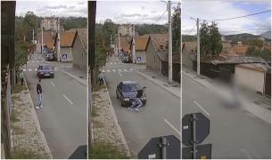 Momentul teribil în care un șofer izbește intenţionat cu maşina un bărbat, pe o stradă din Petroşani. Cei doi s-ar fi certat înainte din cauza copiilor lor