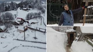 Zăpadă cât casa în Bisoca, județul Buzău. La 73 de ani, tanti Georgeta înfruntă senină troienele: "Cu lopata, mamă, că elicopterul nu vine pe aici"