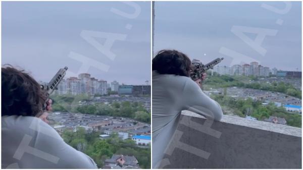 Scene incredibile la Kiev. Un bărbat trage cu arma din balcon spre drona ucraineană, crezând că este una rusească