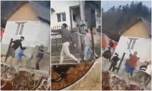 Răfuiala sângeroasă din Maramureș a fost filmată. Momentul în care două familii rivale se bat în stradă cu topoare, securi, lopeţi și bolovani