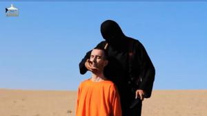 Imagini şocante! Britanicul David Haines, DECAPITAT de jihadişti!