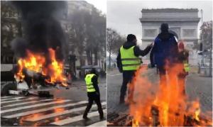 Haos pe Champs Elysees! "Vestele galbene" au dat foc baricadelor ridicate în calea forțelor de ordine, care au ripostat cu tunuri de apă și gaze (Video)