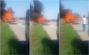 Imagini dramatice pe A1! O maşină a fost cuprinsă de flăcări și a ars sub privirile îngrozite ale oamenilor (Video)