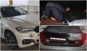 Vietnamez ascuns în portbagajul unui BMW X6, la Vama Turnu, ca să fugă din România